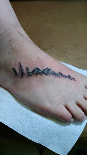 Explore tattoo ideas for two sons, creative tattoo ideas in Hanceville, available at Wildman Tattoo and Body Piercing