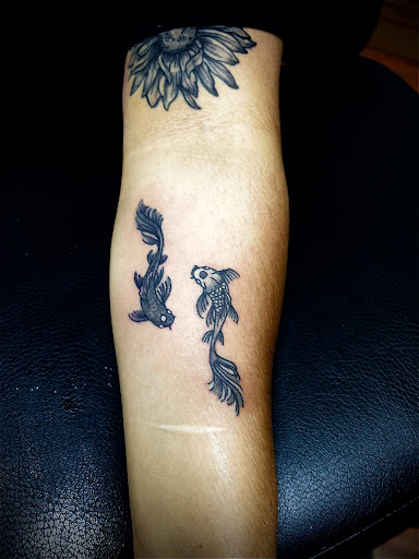 Explore portrait ideas tattoo, creative tattoo ideas in Cocoa, available at Rorschach Tattoo Shop and Piercing Studio