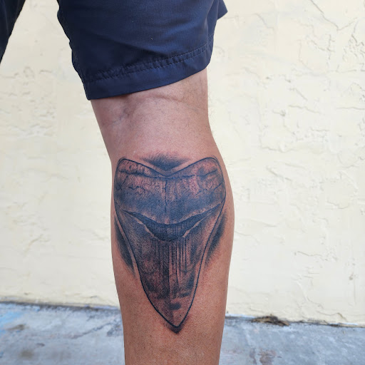 Explore sticker sleeve tattoo ideas, creative tattoo ideas in Venice, available at Ministry of Ink Tattoo & Piercing