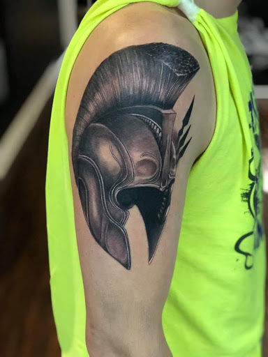 Explore viking tattoo ideas for men, creative tattoo ideas in Dubuque, available at The Crows Nest