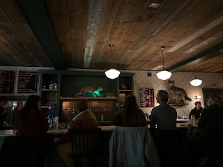 Friends sharing beers at a table