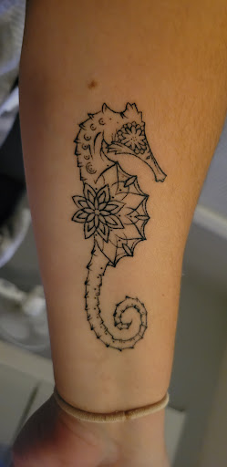 Explore upper back tattoo ideas for guys, creative tattoo ideas in Keene, available at Creative Ink Tattoo Studio