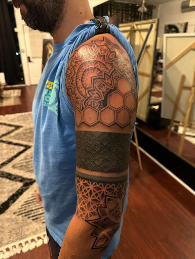 Explore traditional elbow tattoo ideas, creative tattoo ideas in East Northport, available at Cow Harbor Tattoo and Art