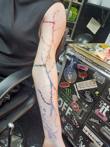 Explore ladies side tattoo ideas, creative tattoo ideas in Hamilton, available at A New Part of You Tattoos and Piercings