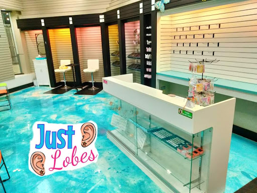 Explore cute woman tattoo ideas, creative tattoo ideas in Warner Robins, available at Just Lobes Family Ear Piercing