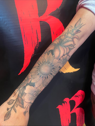 Explore cover up tattoo ideas on thigh, creative tattoo ideas in New York, available at Redink Tattoo Studio