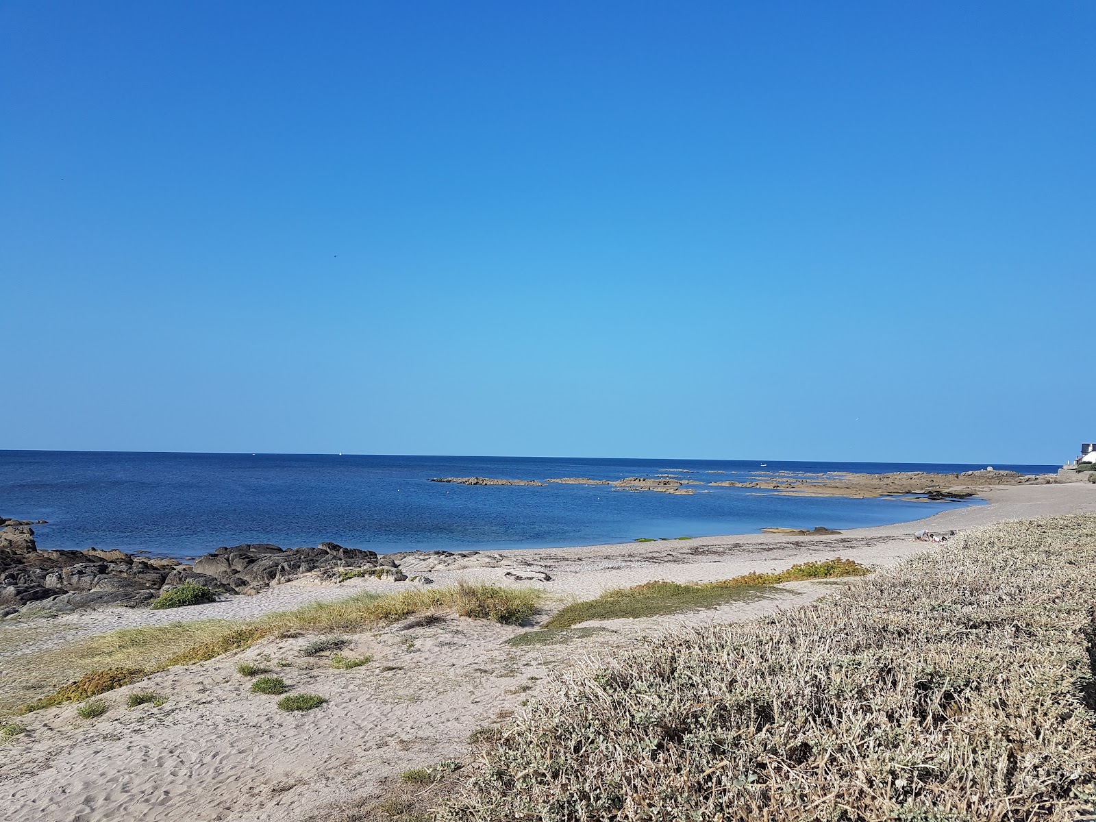 Foto di Plage de Port Lorec con una superficie del sabbia beige