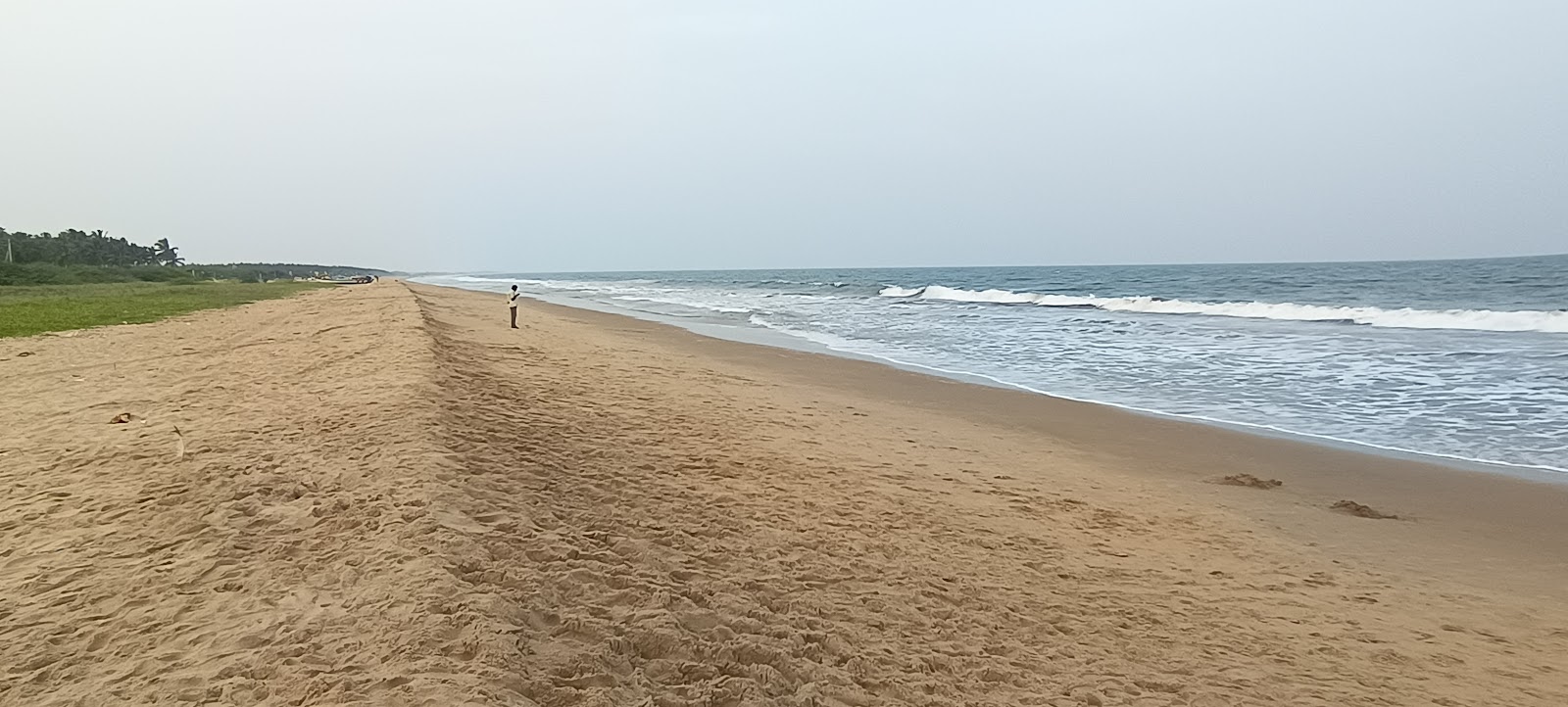 Foto de Madanur Beach com areia brilhante superfície