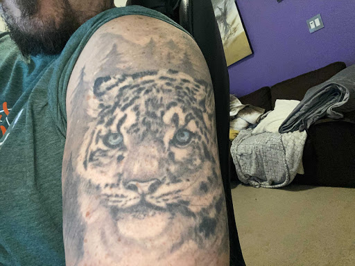 Find poppy tattoo ideas for your next unique tattoo in Clayton at Shades of Gray