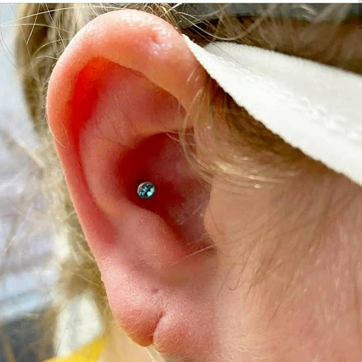 Explore red and black tattoo ideas, creative tattoo ideas in Summerville, available at Exotic Impressions Body Piercing