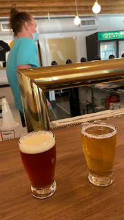 A pint of beer on a bar