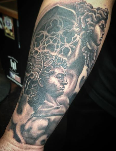 Explore memorial cross tattoo ideas, creative tattoo ideas in San Diego, available at Sideshow Tattoo and Piercing