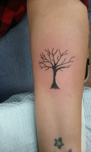 Explore good tattoo ideas for sleeves, creative tattoo ideas in Decatur, available at Exclusive Ink Tattoos & Body Piercings 22nd & Wood