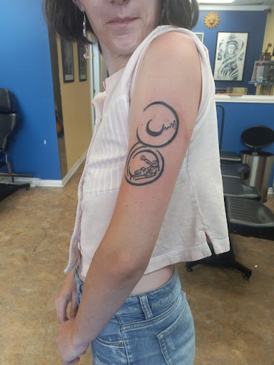 Explore magnolia tattoo ideas, creative tattoo ideas in Orange Beach, available at Orange Beach Tattoos