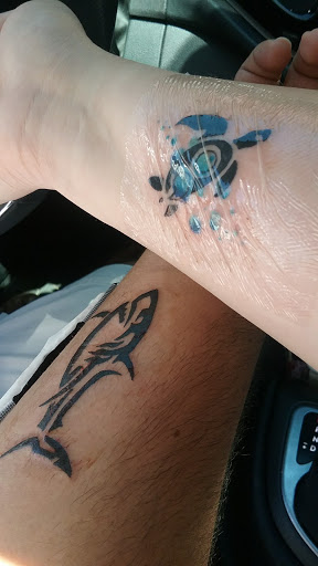 Explore cervical cancer tattoo ideas, creative tattoo ideas in Panama City Beach, available at Oxygen Tattoo and Body Piercing Studio