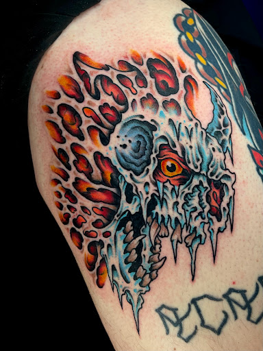 Explore jake the dog tattoo ideas, creative tattoo ideas in Johnson City, available at Gold Cross Tattoo Co.