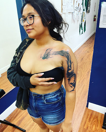 Explore lion forearm tattoo ideas, creative tattoo ideas in Cocoa, available at Rorschach Tattoo Shop and Piercing Studio