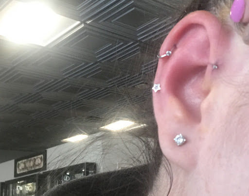 Explore tattoo book ideas, creative tattoo ideas in Cambridge, available at Luckys Tattoo and Piercing