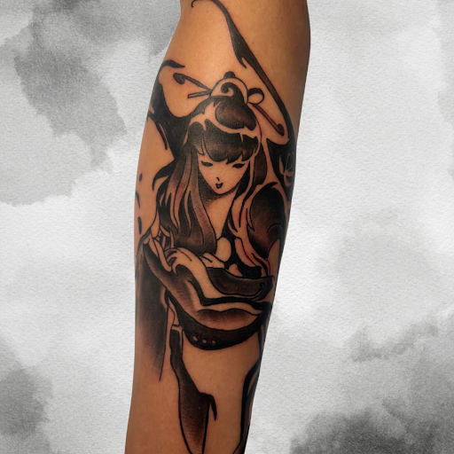 Explore cake tattoo ideas, creative tattoo ideas in Los Alamitos, available at Mr. Inkwells Classy Tattoos