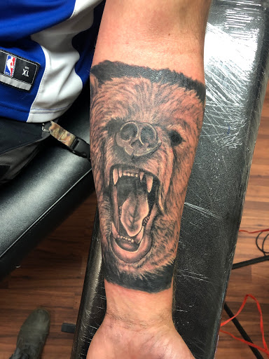 Explore basketball tattoo ideas for guys, creative tattoo ideas in Alamosa, available at The Shop Tattoo & Comics
