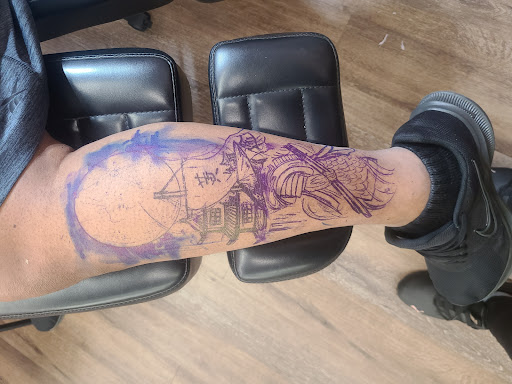 Explore lower back cover up tattoo ideas, creative tattoo ideas in Saint Charles, available at Permanent Vacation Tattoo