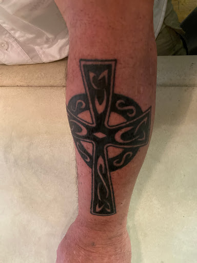 Find halo tattoo ideas for your next unique tattoo in North Charleston at Blu Gorilla Tattoo