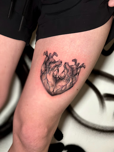 Explore graffiti tattoo ideas, creative tattoo ideas in San Antonio, available at Ink & Iron Tattoos & Piercings