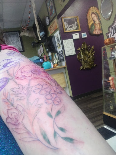 Explore word tattoo ideas for men, creative tattoo ideas in Tacoma, available at Rolling Gypsy Tattoo