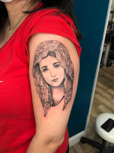 Explore outcast tattoo ideas, creative tattoo ideas in Buford, available at Wild Tribe Tattoos and Piercings