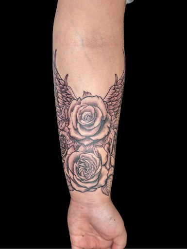 Explore feather tattoo ideas for men, creative tattoo ideas in Longmont, available at Sharkys Paradise