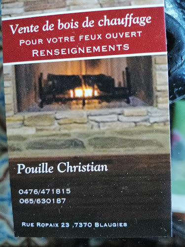 Magasin de bois de chauffage Pouille / Christian Dour