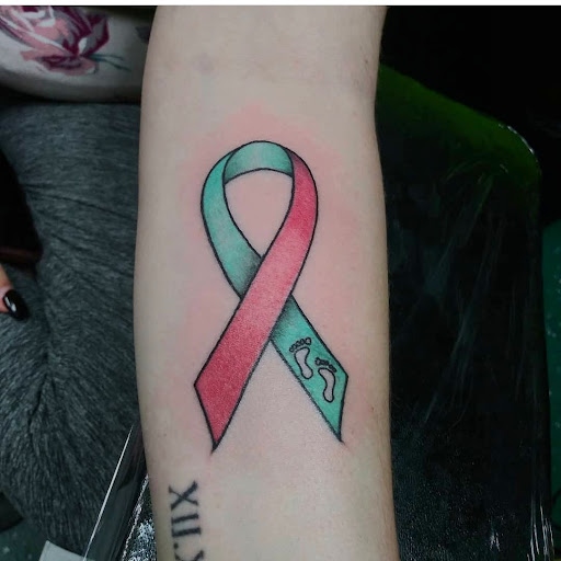 Explore wlw tattoo ideas, creative tattoo ideas in Vancouver, available at Studio X Tattoos & Piercings