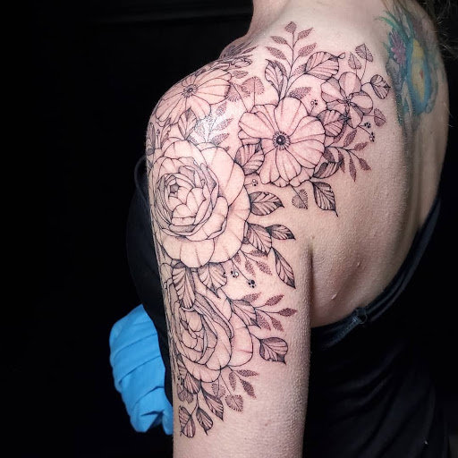 Explore arm shoulder tattoo ideas, creative tattoo ideas in Stevens Point, available at International Ink Tattoos