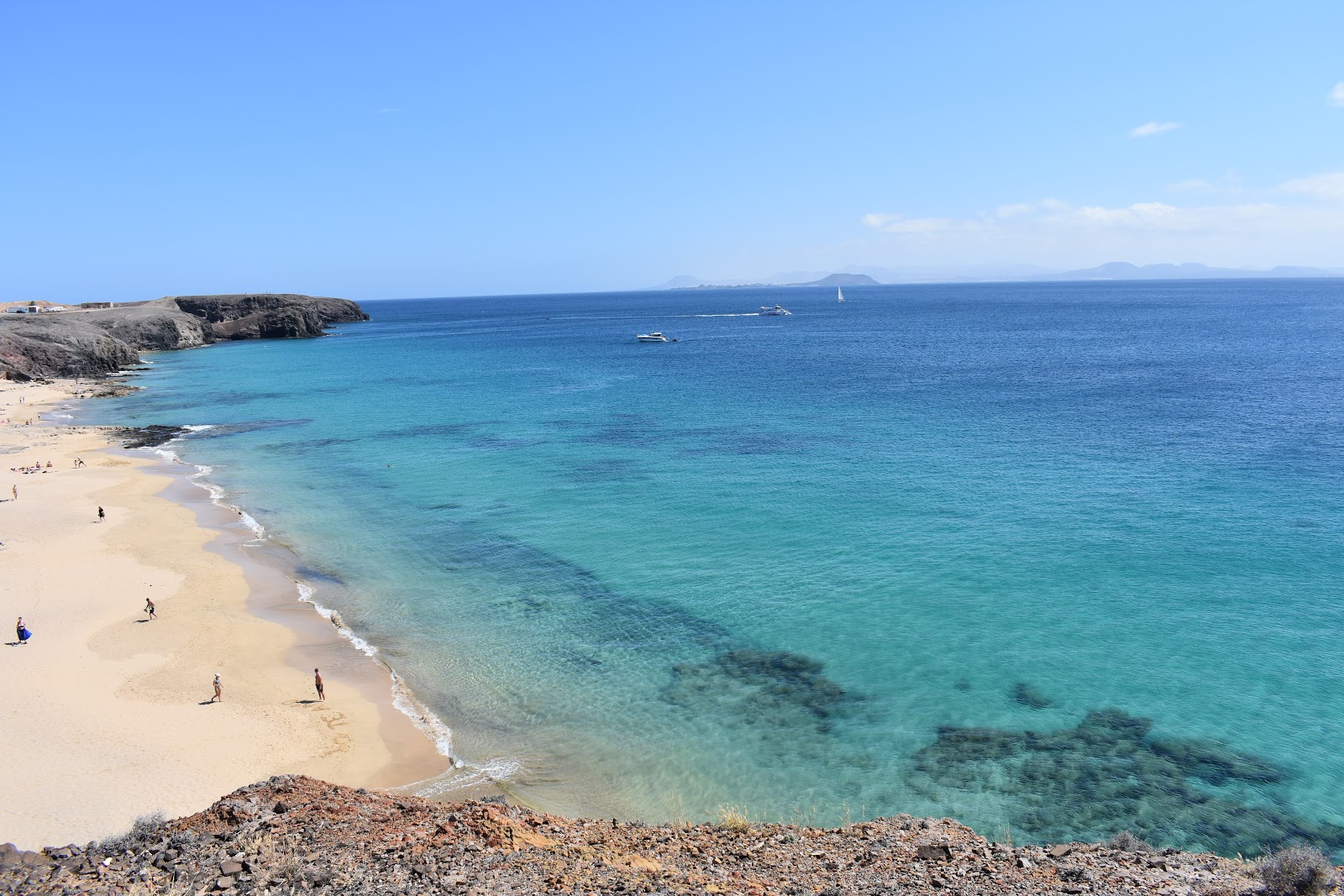 Foto von Playa del Pozo mit feiner beiger sand Oberfläche