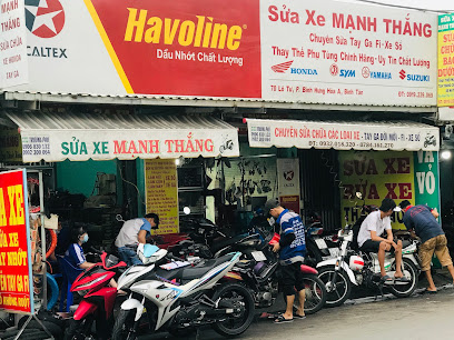 Hình Ảnh Cửa Hàng Sửa Xe Mạnh Thắng thương hiệu do Dầu Nhớt Caltex tài trợ