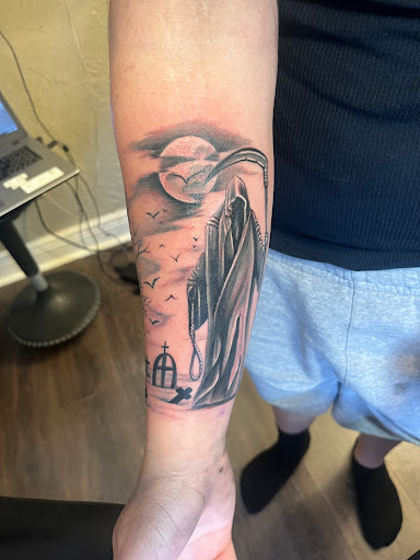 Explore wolf neck tattoo ideas, creative tattoo ideas in College Station, available at The Ineffable Tattoo Experience