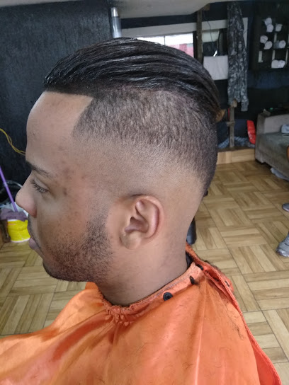 Logo da empresa - 1000 Volts Barbearia