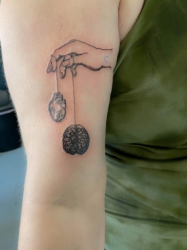 Explore men tattoo ideas sleeve, creative tattoo ideas in Bowling Green, available at Ink Therapy and Body Piercing