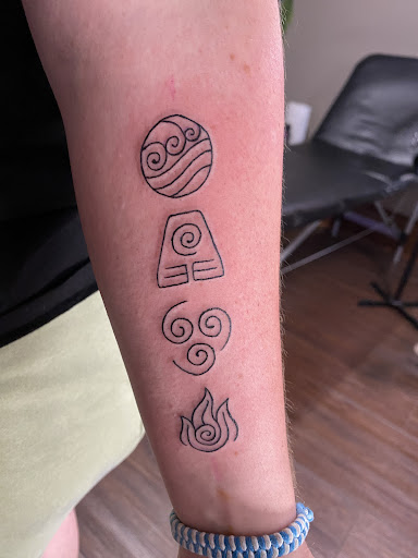Explore nature sleeve tattoo ideas, creative tattoo ideas in Logan, available at Abyss Tattooing