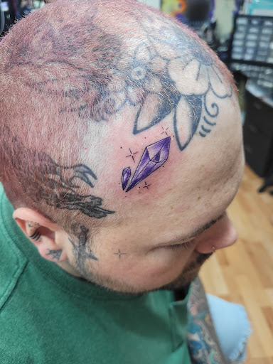 Explore family heart tattoo ideas, creative tattoo ideas in Benton, available at Spectrum Tattoo