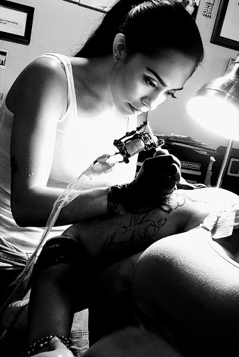 Explore lady thigh tattoo ideas, creative tattoo ideas in Kissimmee, available at Fallen Sparrow Tattoo Co