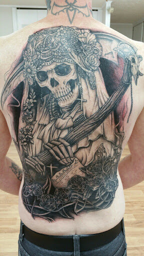 Explore behind the ear tattoo ideas, creative tattoo ideas in Muncie, available at The Tattoo Studio