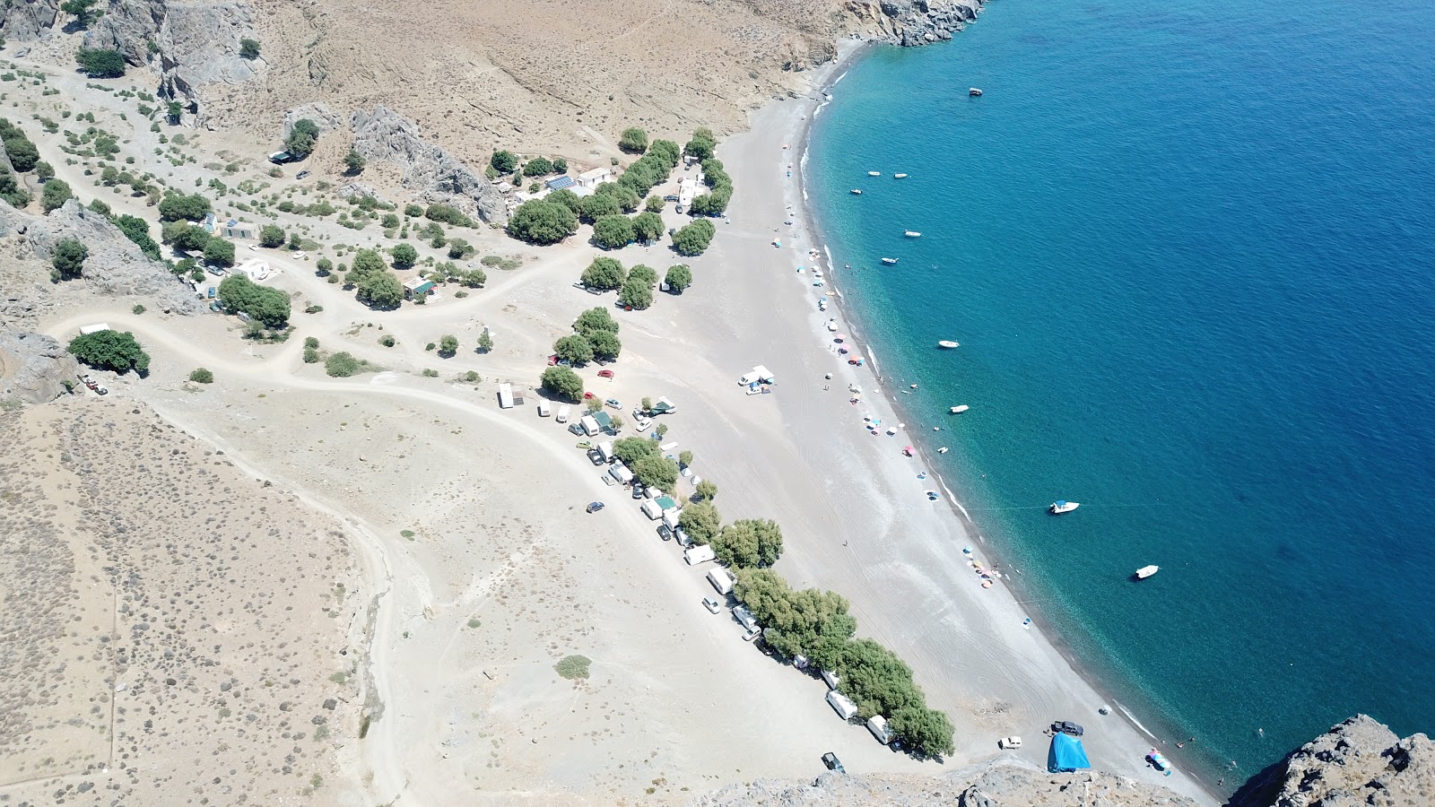 Photo of Trypiti beach with turquoise pure water surface