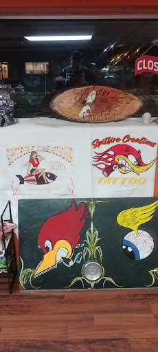 Explore phoenix tattoo ideas for females, creative tattoo ideas in Green Bay, available at SPITFIRE CREATIONS