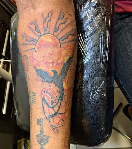 Explore swimming tattoo ideas, creative tattoo ideas in Kenner, available at Tattoology