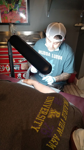 Explore umbrella tattoo ideas, creative tattoo ideas in Arlington, available at Urbans Tattoo & Piercing Studio