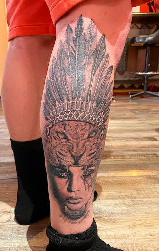 Find best female tattoo ideas for your next unique tattoo in Lander at Blackblood Tattoo and Piercing