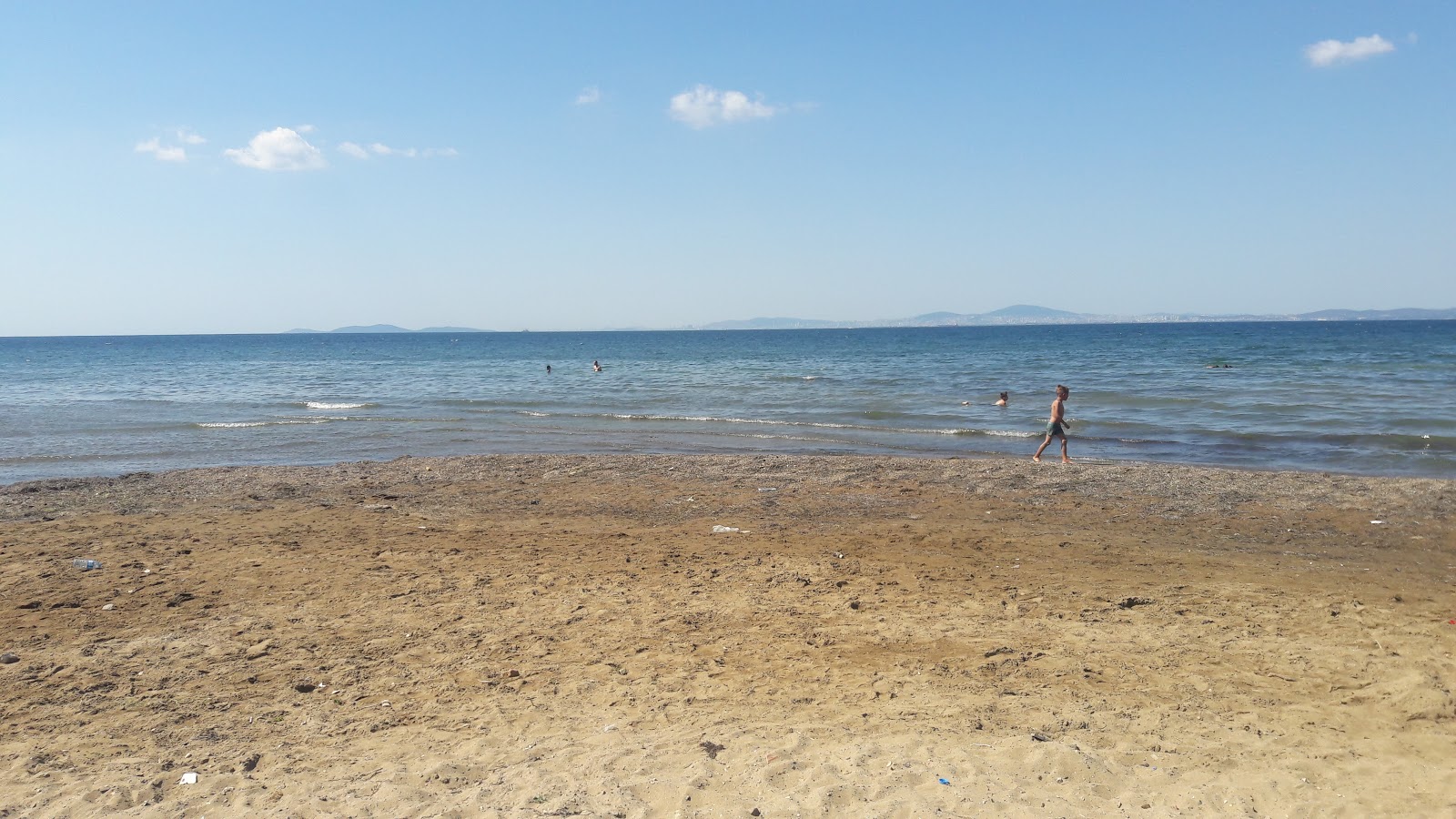 Foto von Dejavu beach mit türkisfarbenes wasser Oberfläche