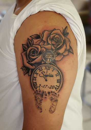 Explore rose tattoo ideas, creative tattoo ideas in Stamford, available at KE Tattoo Studio