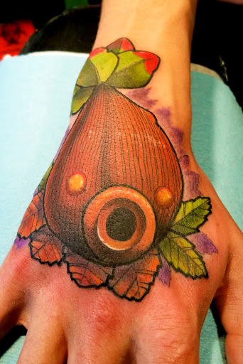 Explore floral sleeve tattoo ideas, creative tattoo ideas in Denver, available at CREATUREARCADE TATTOO AND ILLUSTRATION-LOCATED IN LAKEWOOD CO